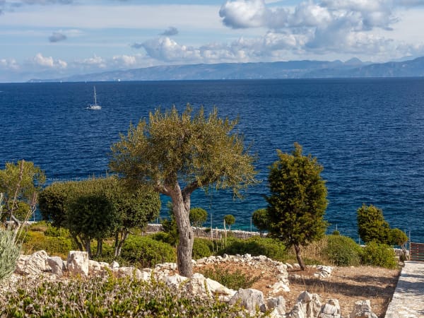 The path on the right leads down to the sea.